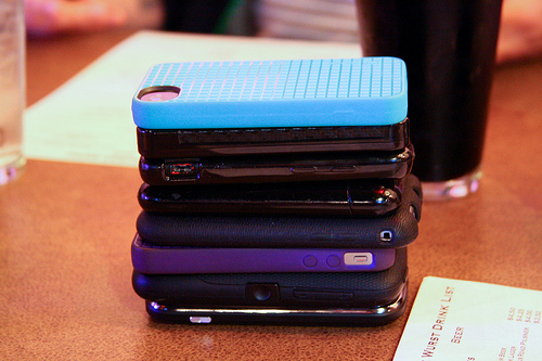 Stuck To Your Device? Phone Stacking Re-arranges Device Etiquette
